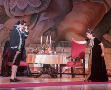 Opera San José concludes its 2022-23 season with a vivid production of Puccini’s "Tosca," presented April 15–30, 2023 at the California Theatre in San Jose.  Seen here: Matthew Hanscom as Scarpia and Olga Chernisheva as Tosca in OSJ's 2015 production.