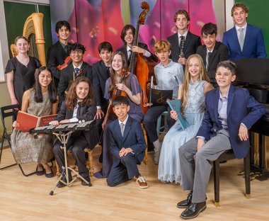 15 young classical musicans in a group