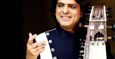 Kamal Sabri with his sarangi : a traditional bowed, short-necked string instrument used in South Asia, particularly in North Indian Hindustani and Nepali folk music.