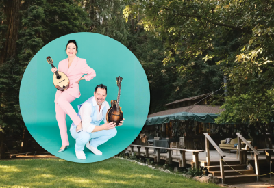 Mike Marshall and Caterina Lichtenberg pose wearing pastel-colored suits. Background image is of the Henry Miller Library.