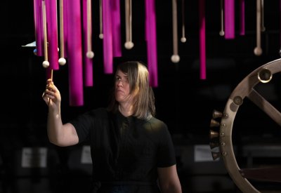 Photo of woman playing percussion instrument