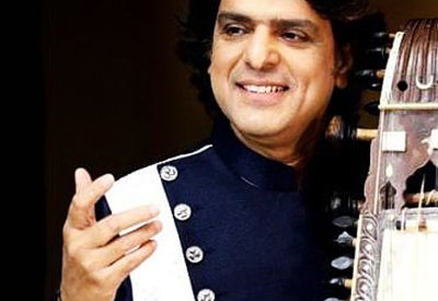 Kamal Sabri with his sarangi : a traditional bowed, short-necked string instrument used in South Asia, particularly in North Indian Hindustani and Nepali folk music.